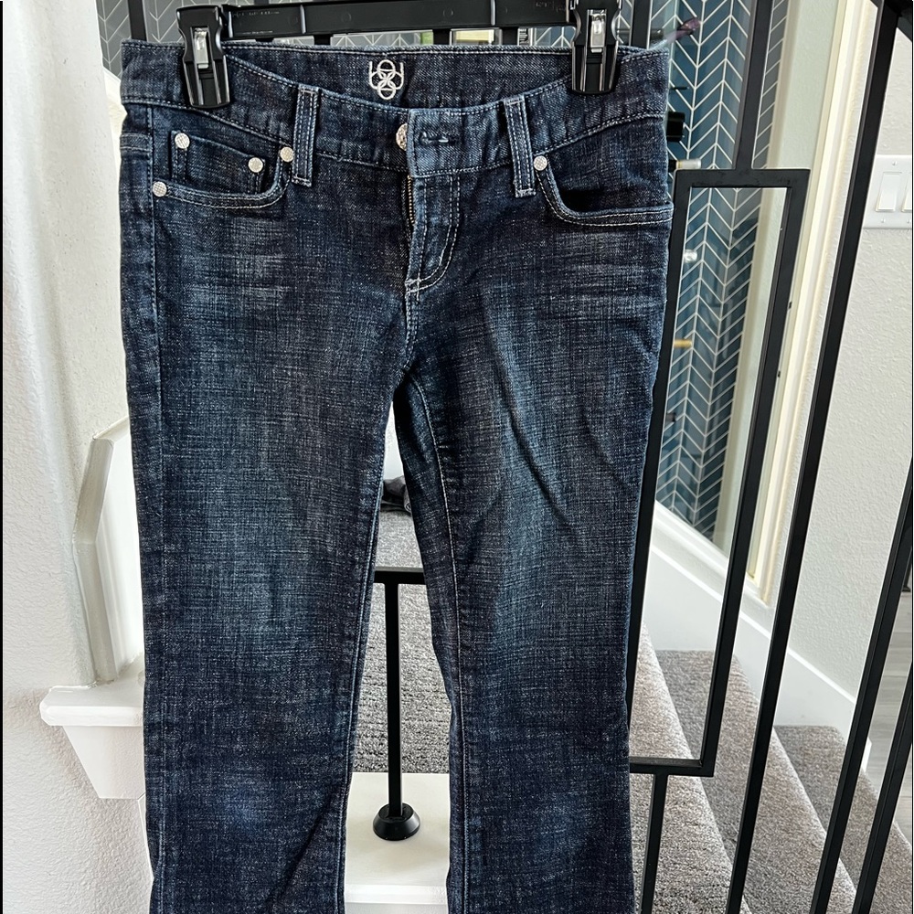 Bebe low rise bootcut jeans in size 27